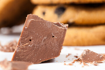 divided into pieces a piece of chocolate from cocoa