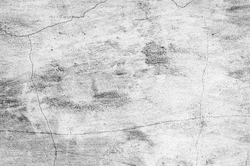 Texture of a concrete wall with cracks and scratches which can be used as a background
