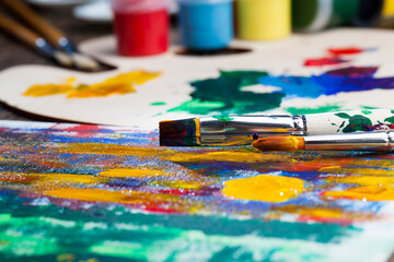 Obraz premium creative process of drawing by mixing different colors