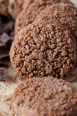 chocolate cookies close-up on an old kitchen table