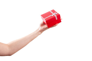 a female hand holding red gift box over white