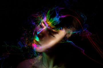 Fototapeta premium lightpainting portrait, new art direction, long exposure photo without photoshop, light drawing at long exposure 