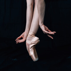 Ballerina's pointe shoes close up - 441004848