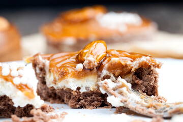 tartlet with milk cheese filling and lots of salted caramel with nuts