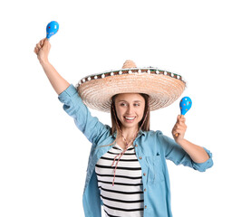 Happy young Mexican woman in sombrero hat and with maracas on white background
