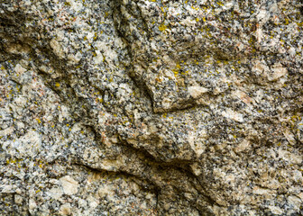 stone wall texture. Granite texture.  Background image of a wild stone.