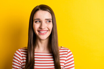 Fototapeta premium Photo of sweet long hairdo millennial lady look empty space wear red sweater isolated on vibrant yellow color background