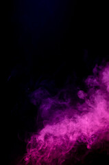 Abstract pink smoke isolated on black background