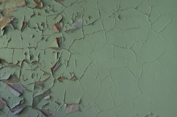 Horizontal grunge background - wall covered with cracked paint