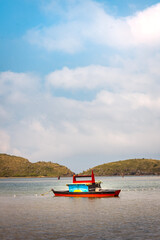 cold boat fishermen island river mountains