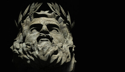 3d render illustration of stone greek god Zeus face on black background. © breakermaximus