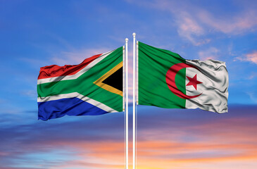 Algeria and South Africa flags against of blue sky