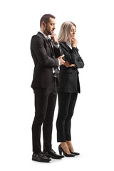 Professional man and woman standing and thinking