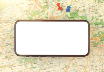 Map navigation concept with mobile phone and city map with oush pins on a background, copy space