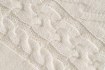 Background Of Knitted Fabric Close Up.