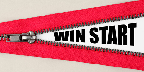 On a gray background, a red zipper unfastens, on a white surface the inscription - WIN START