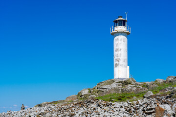 Fototapeta na wymiar Subbe lighthouse with clear blue sky in Varberg, Sweden.