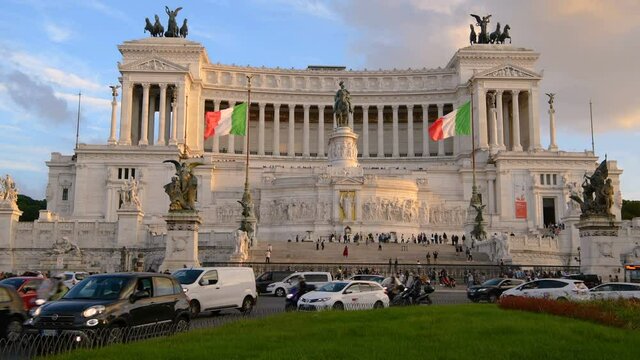 Altare della Patria - An evening view of the busy street at Piazza Venezia in front of the Altare della Patria, also known as The Monument of Victor Emmanuel II, at centra of Rome, Italy.