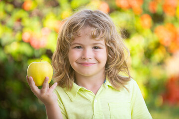 Child kid eating apple fruit outdoor autumn fall nature healthy outdoors.