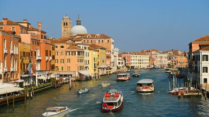 Grand Canal - A panoramic view of busy and colorful Grand Canal at near the Venice Santa Lucia Railroad Station, Venice, Italy. - Powered by Adobe