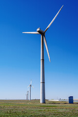 Fototapeta premium Wind turbines in the spring steppe. the picture was taken in Russia, in the Orenburg region