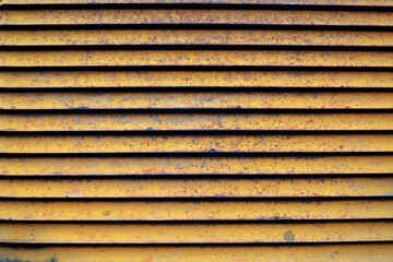 yellow metal background horizontal lines pattern heavy machine