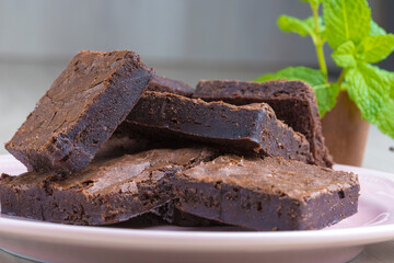 brownie pieces on a pink plate