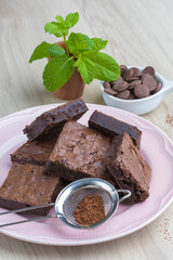brownie pieces on a pink plate