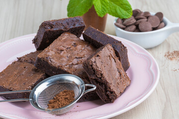 brownie pieces on a pink plate