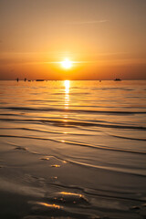 Summer sunset at sea. A resort place to relax at sunset. text place.