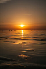 Summer sunset at sea. A resort place to relax at sunset. text place.