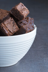 brownie cubes in a white bowl