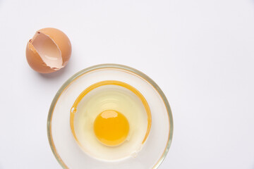 eggs and bowl on white background