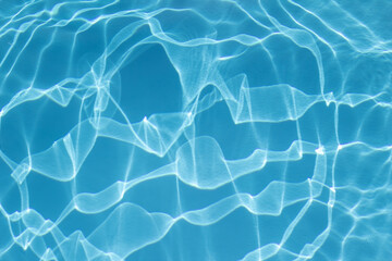Blue pool bottom background with patterns. Water caustics
