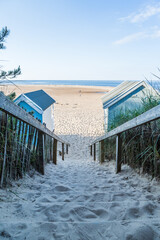 Fototapeta na wymiar Sandy steps lead down to the beach at Wells next the Sea