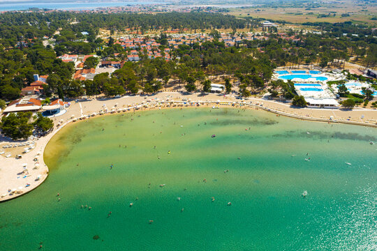 Aerial view of the beach with a swimming pool in Zaton Resort, Croatia