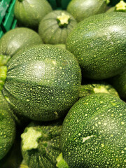 Zucchini in a shop window for sale