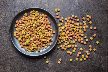 Dry kibble animal food. Dried food for cats or dogs.