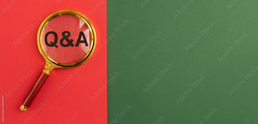 Poster qna inscription on red and green banner through magnifying glass. qa acronym. q concept. questions a