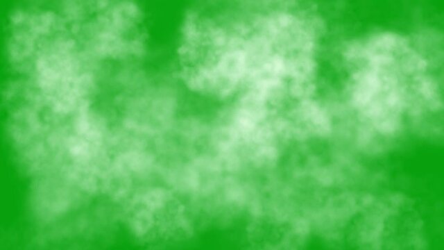 An abstract background of fleeting smoke against a green chroma background in 4K