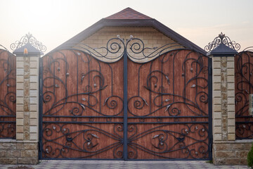 Luxury metal wrought gates with decorative elements