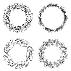 Hand drawn vector black floral rustic circle wreaths with plant leaves and branches on white background