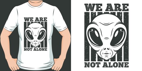 This We Are Not Alone design is perfect for print and merchandising. You can print this design on a T-Shirt, Hoodie, Poster, Sticker and many more merchandising according to your needs.