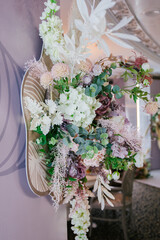Floral decor on a volumetric photo zone, live and artificial plants, handmade