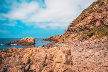 Scenic cliffs of Kullaberg nature reserve in Sweden. Popular tourist destination for hiking.