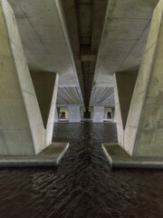 An underpass underneath a highway