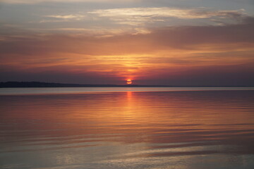 Fototapeta na wymiar sunset at the beach. sunset in the sea. sunset over the sea. 