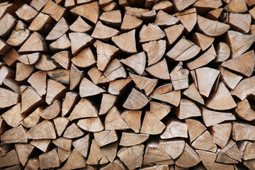 Background with firewood in a pile