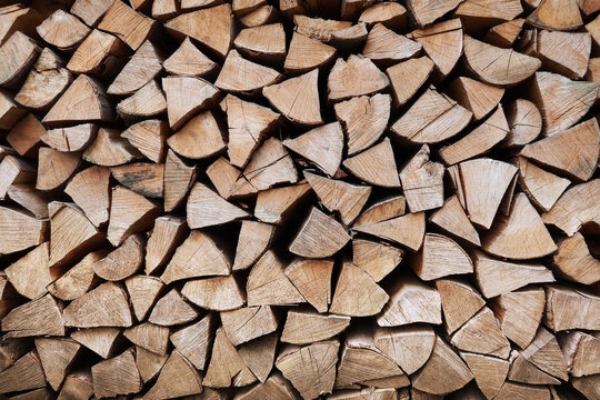Background with firewood in a pile
