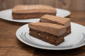 Sliced homemade sweet caramel and nut cake